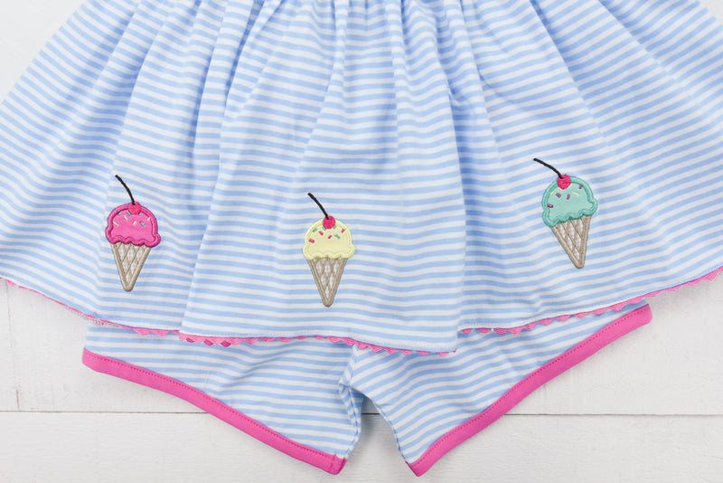 a blue and white striped skirt with ice cream on it