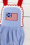 a blue dress with a red and white american flag on it