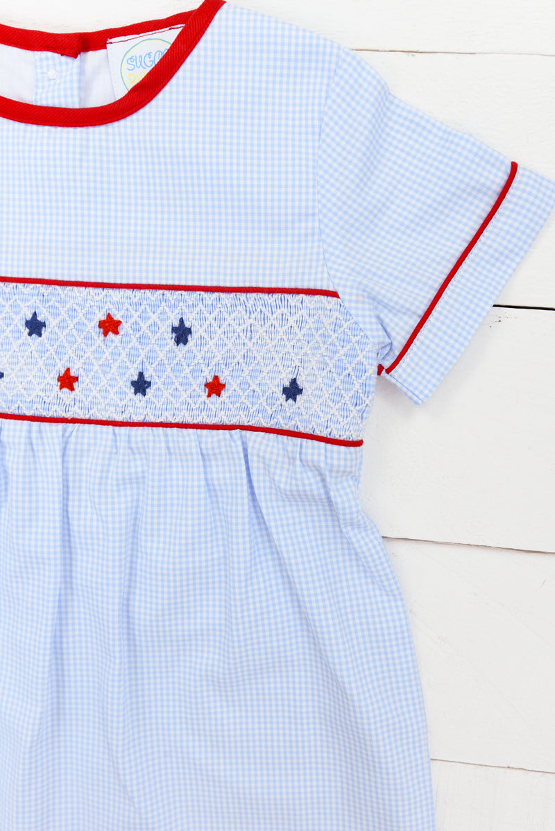 a blue and white dress with stars on it