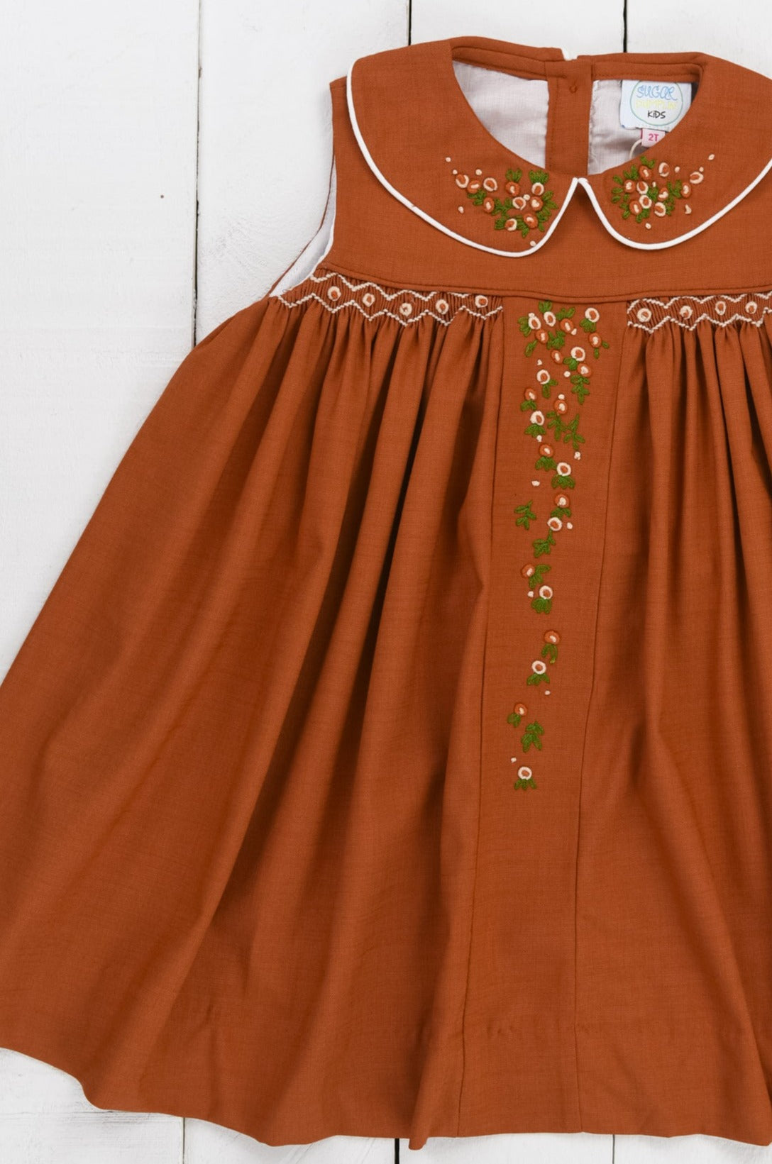 PO95: Girls Rust Linen Smocked Dress
