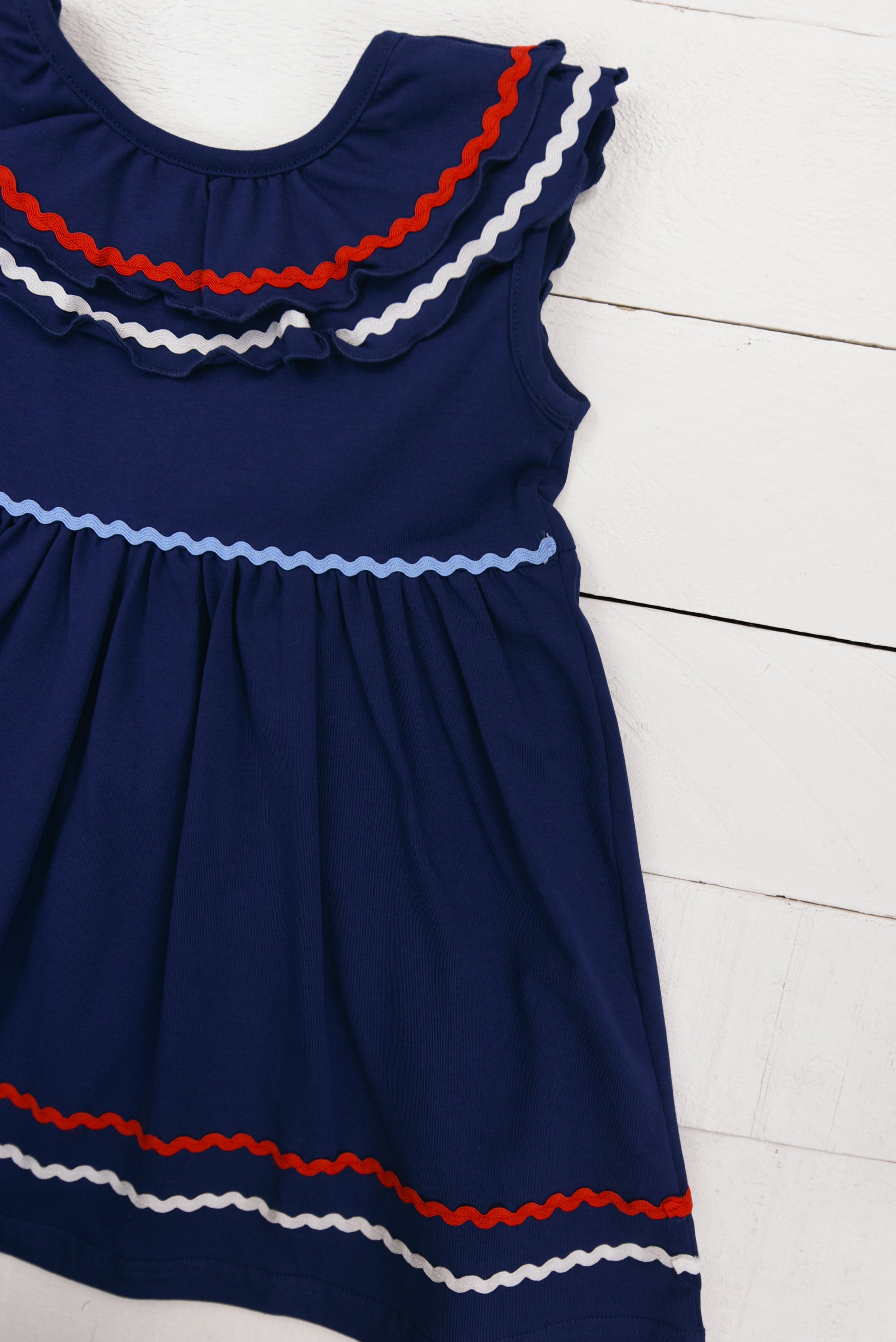 a blue dress with red, white, and blue stripes